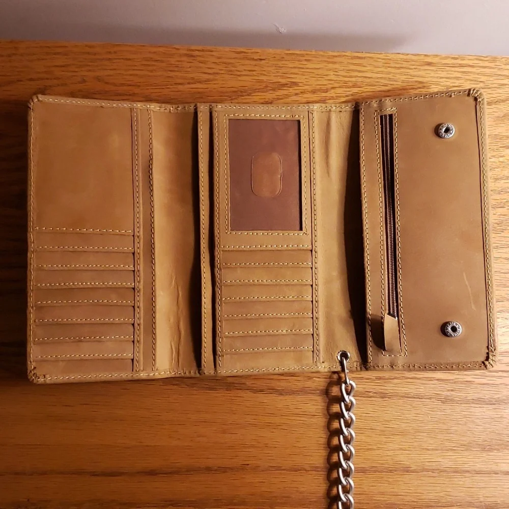Unbranded tri-fold brown leather wallet with 19